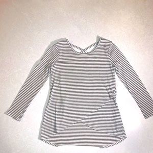 Cute girl’s white and grey striped long sleeve top